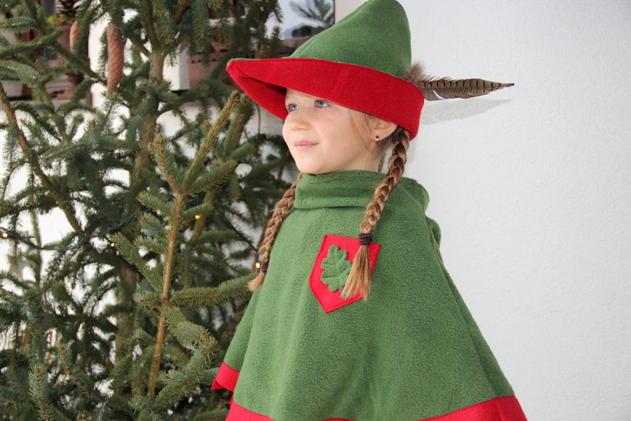 Child wearing the Vah robin hood costume cape and hat