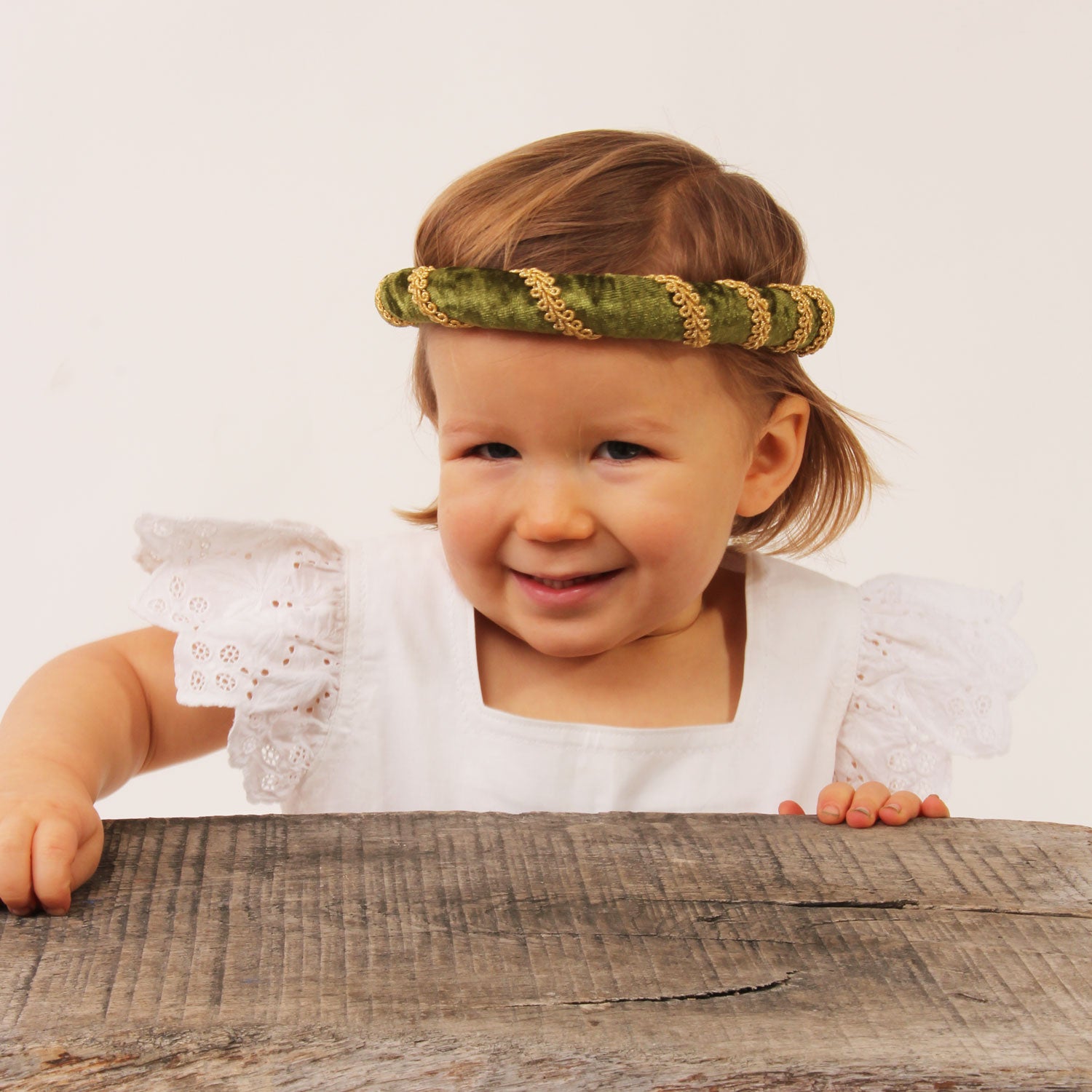 Child wearing the Vah Isabella Medieval Veil - Green