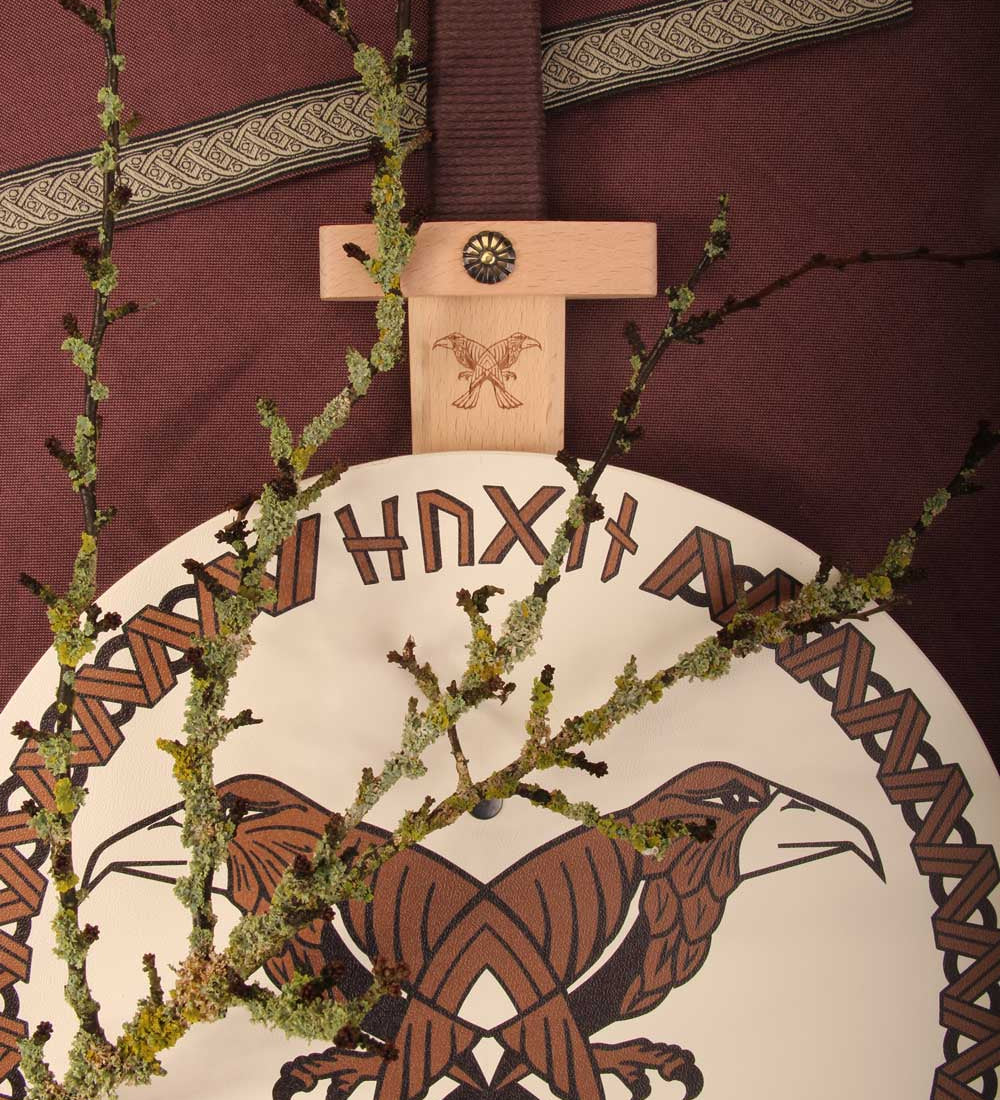 Vah Hugin & Munin Viking Round Wooden Shield with mossy branches laid on top