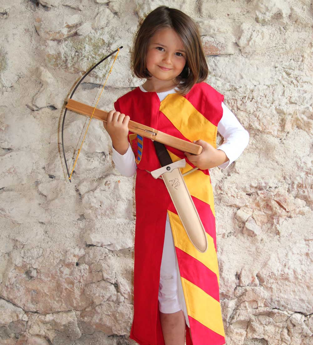 Child wearing a Vah red & yellow Lancelot costume Tunic