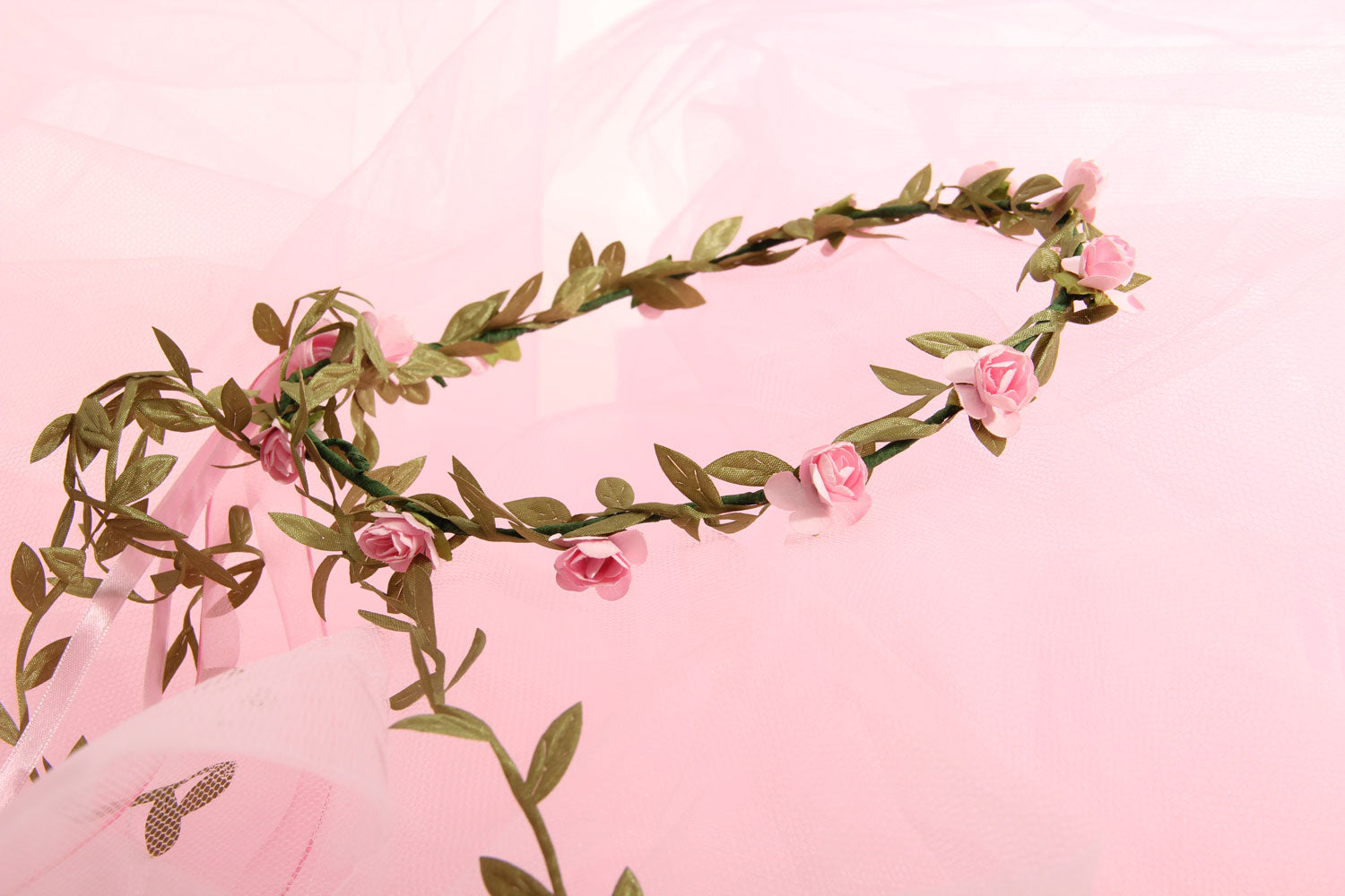 vah pink flower crown pictured on a pin colored voile material