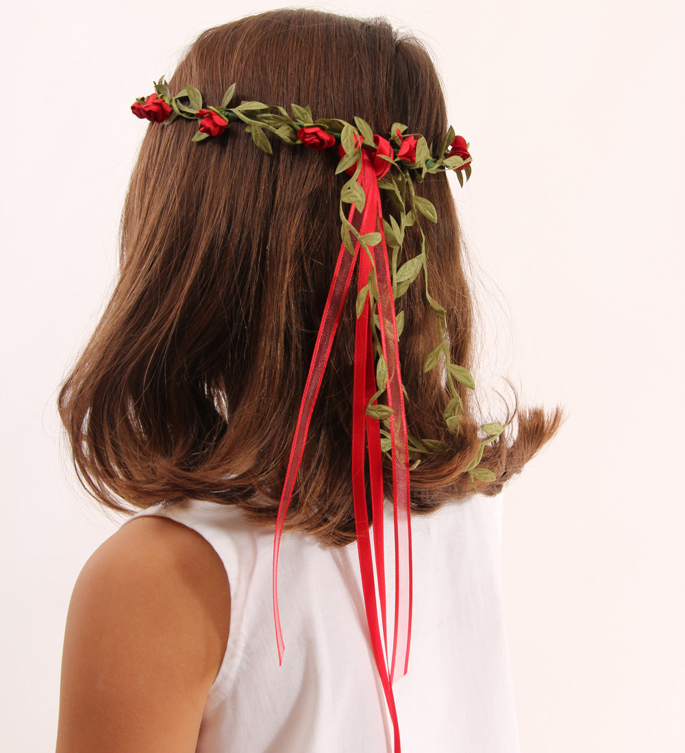 Child wearing the Vah red Flower Crown. View of back of child's head