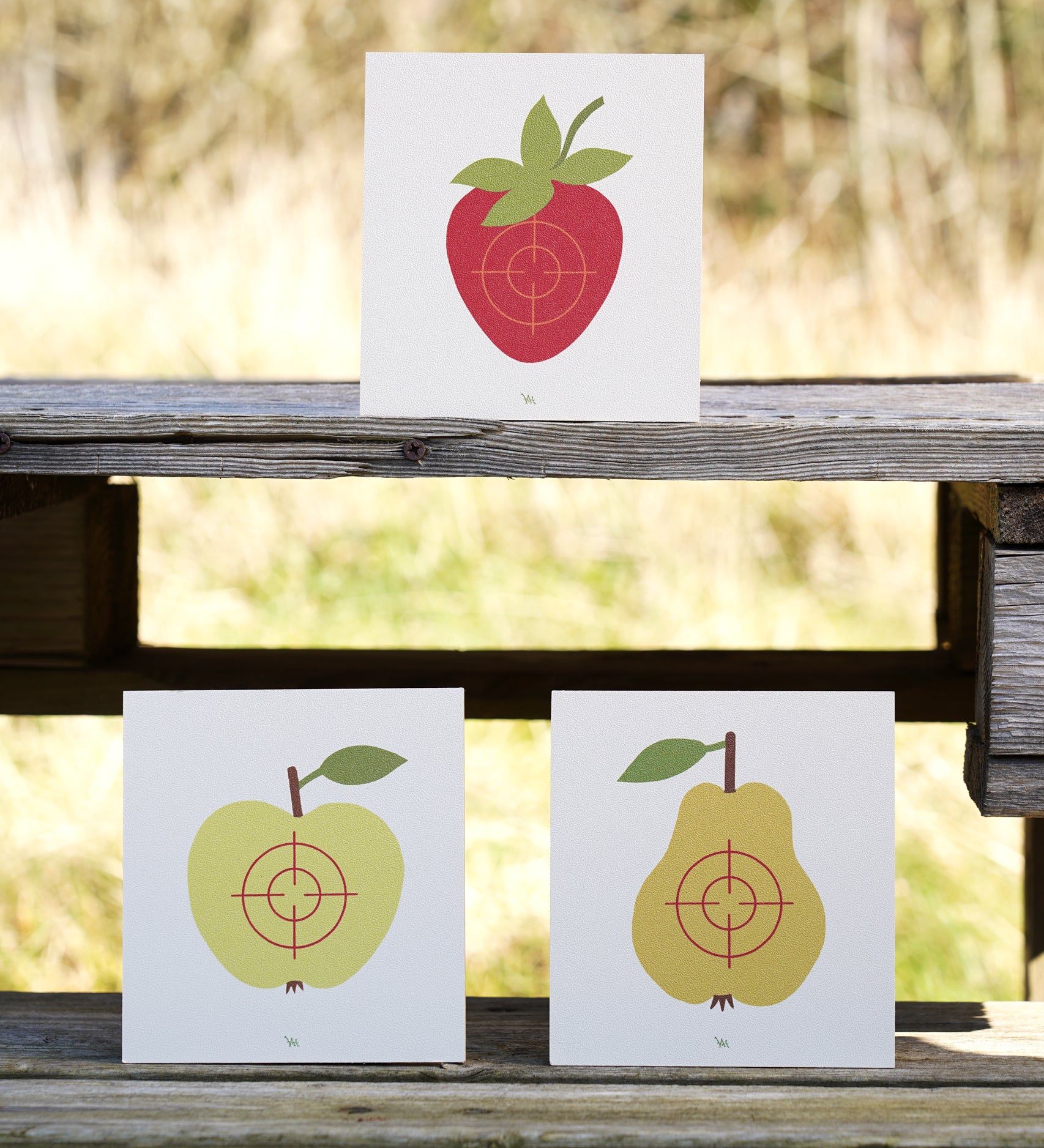 Vah Wooden Fruit Target Trio for Safety Arrows. One target has a strawberry, one has an apple and the third has a pear. 