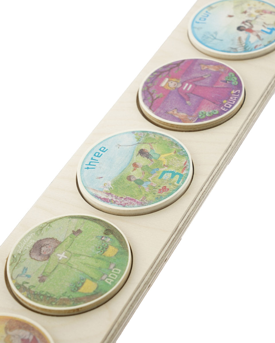 Close up of the Waldorf Family eco-friendly wooden maths coins in the Maths base on a white background