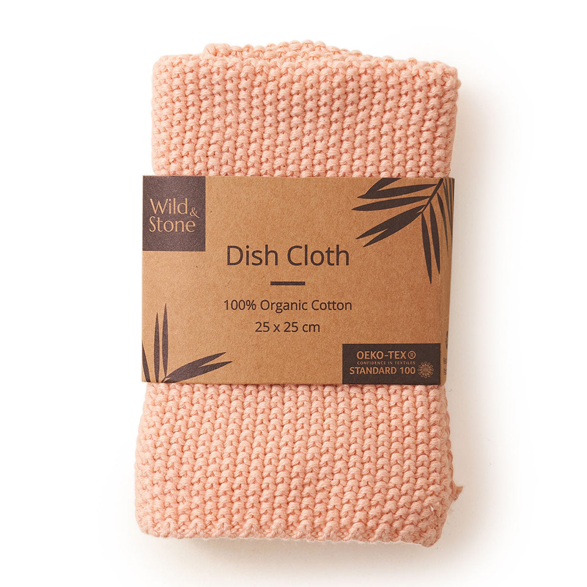 Wild and Stone blush pink organic cotton dish cloth folded in its cardboard sleeve on a white background