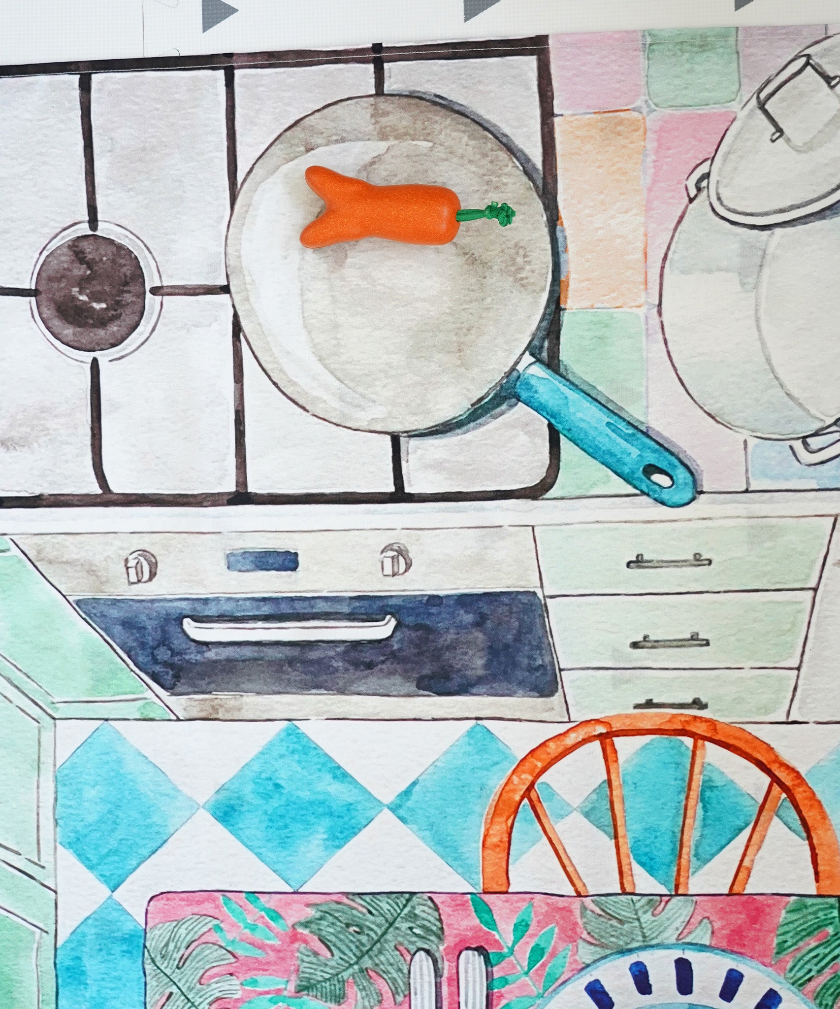  vegetables and bread are displayed on the Kitchen Wonderie Play cloth table