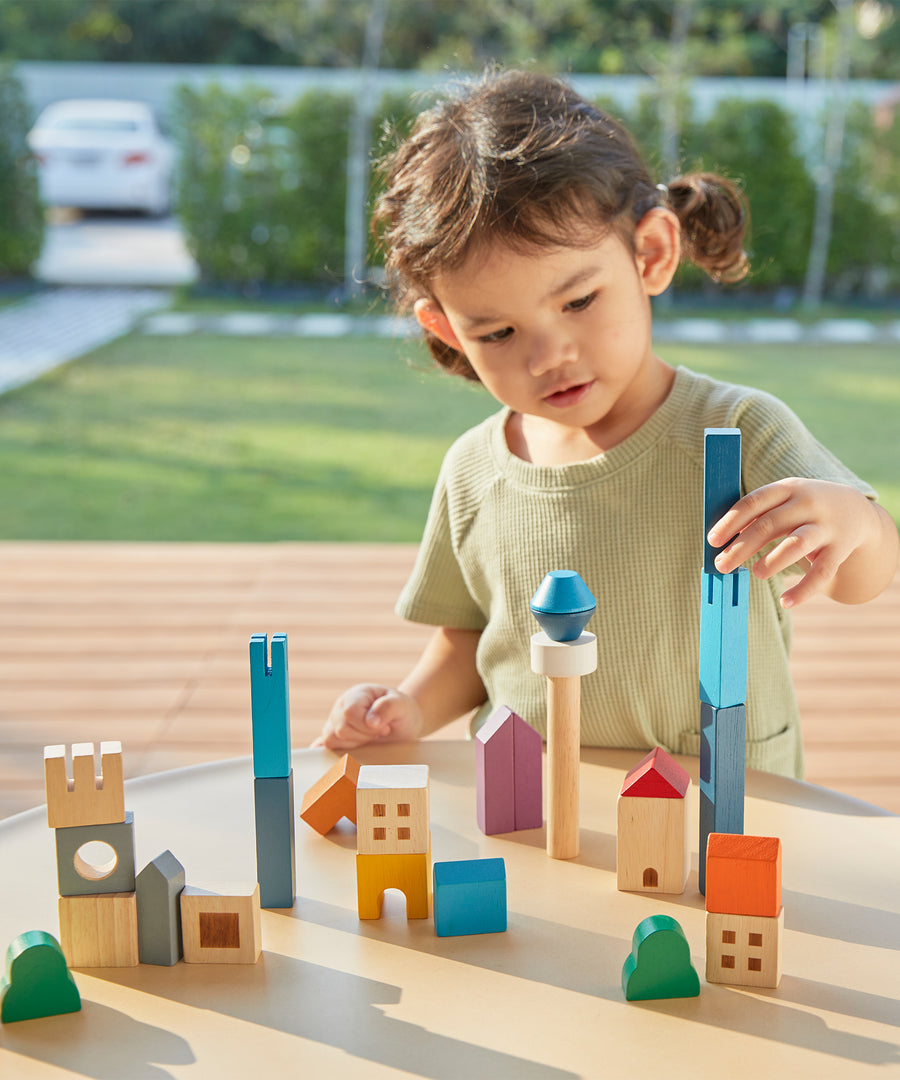 The PlanToys Cityscape Blocks. A set of 27 wooden blocks for creative