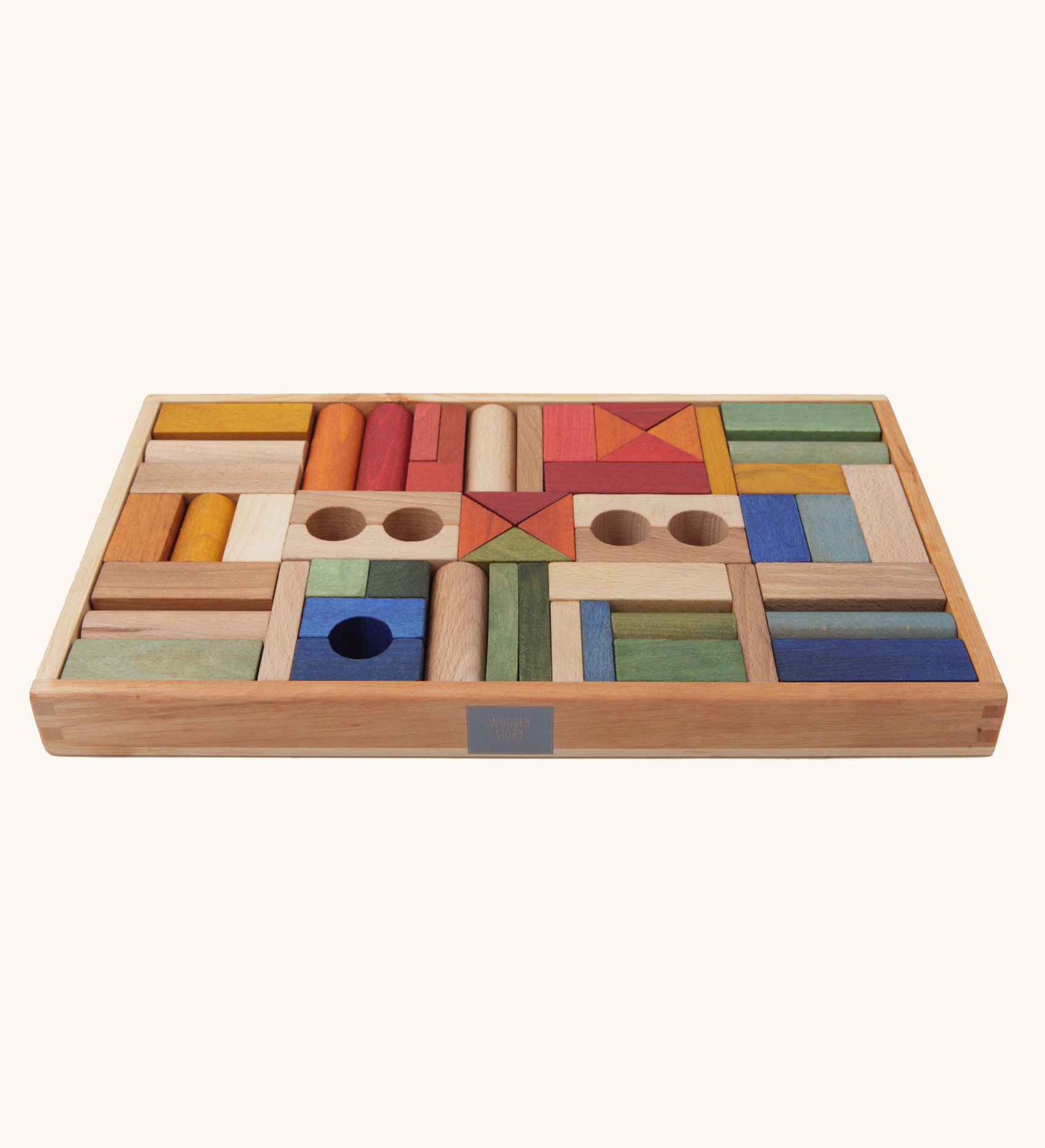 Wooden Story 54 Rainbow Blocks in Tray on a plain background. 