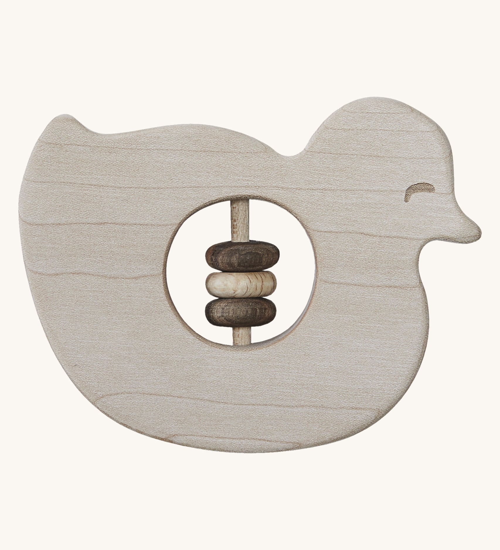 Wooden Story Baby Duck Rattle on a plain background. A baby duck shaped rattle with  cut-out in the middle which has three wooden rings on a wooden rod. 