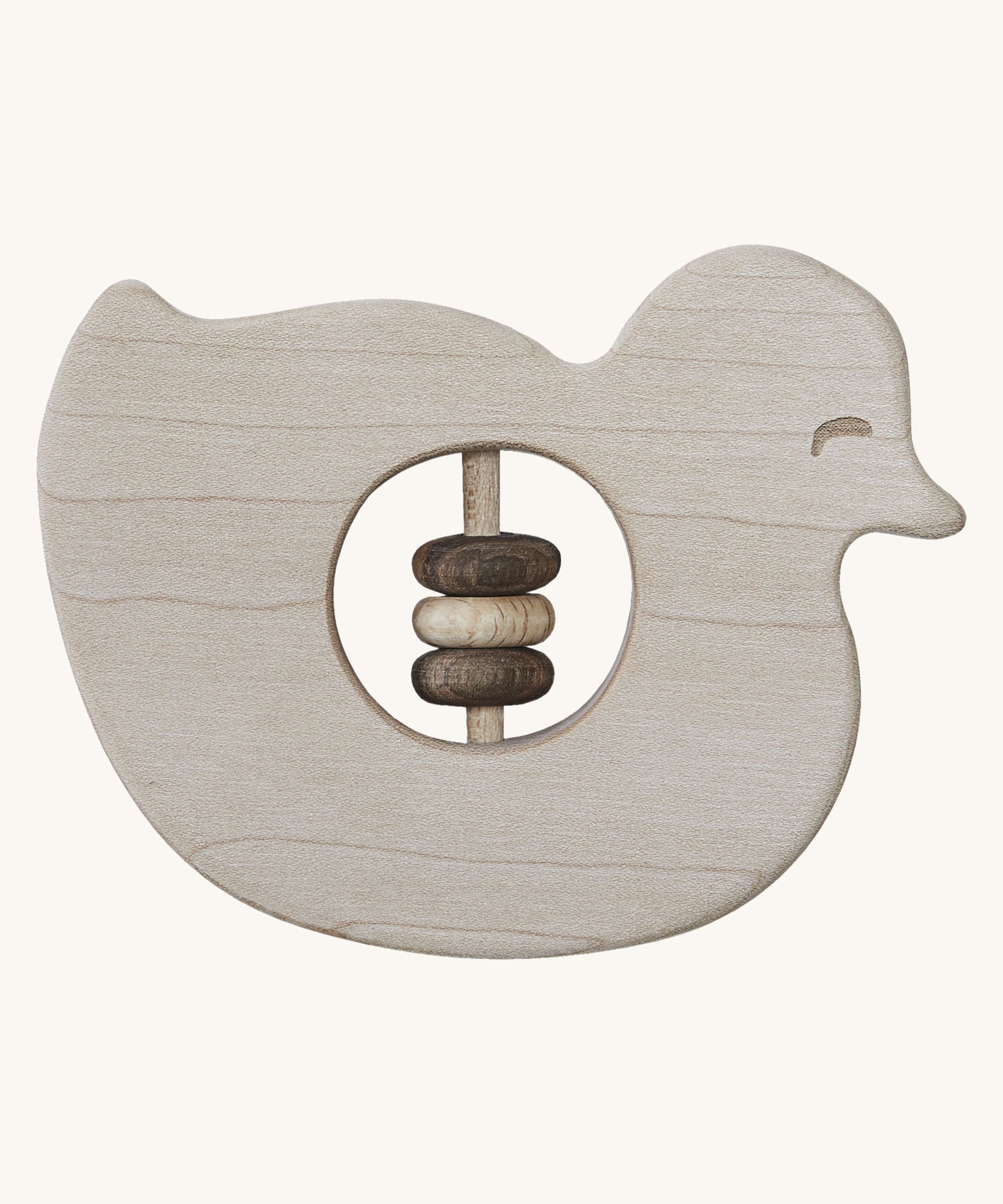 Wooden Story Baby Duck Rattle on a plain background. A baby duck shaped rattle with  cut-out in the middle which has three wooden rings on a wooden rod. 