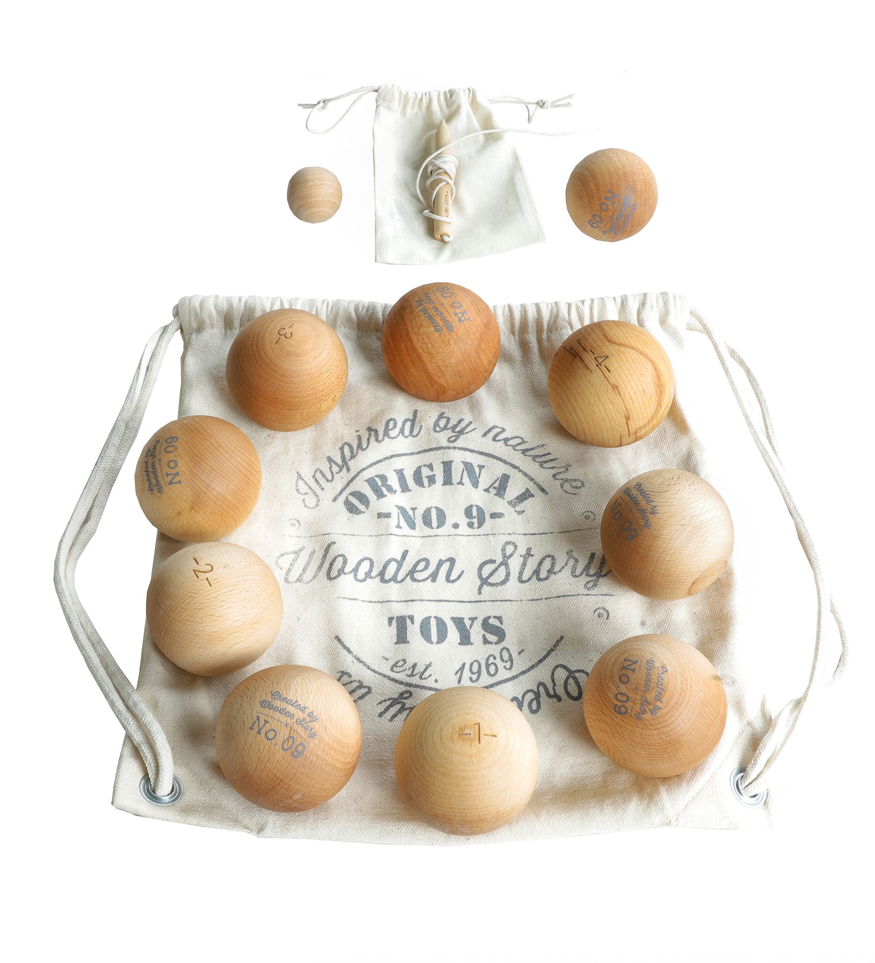 Wooden Story Boules set. The set contains the wooden boules balls and a smaller target ball, called cochonnet or jack. 