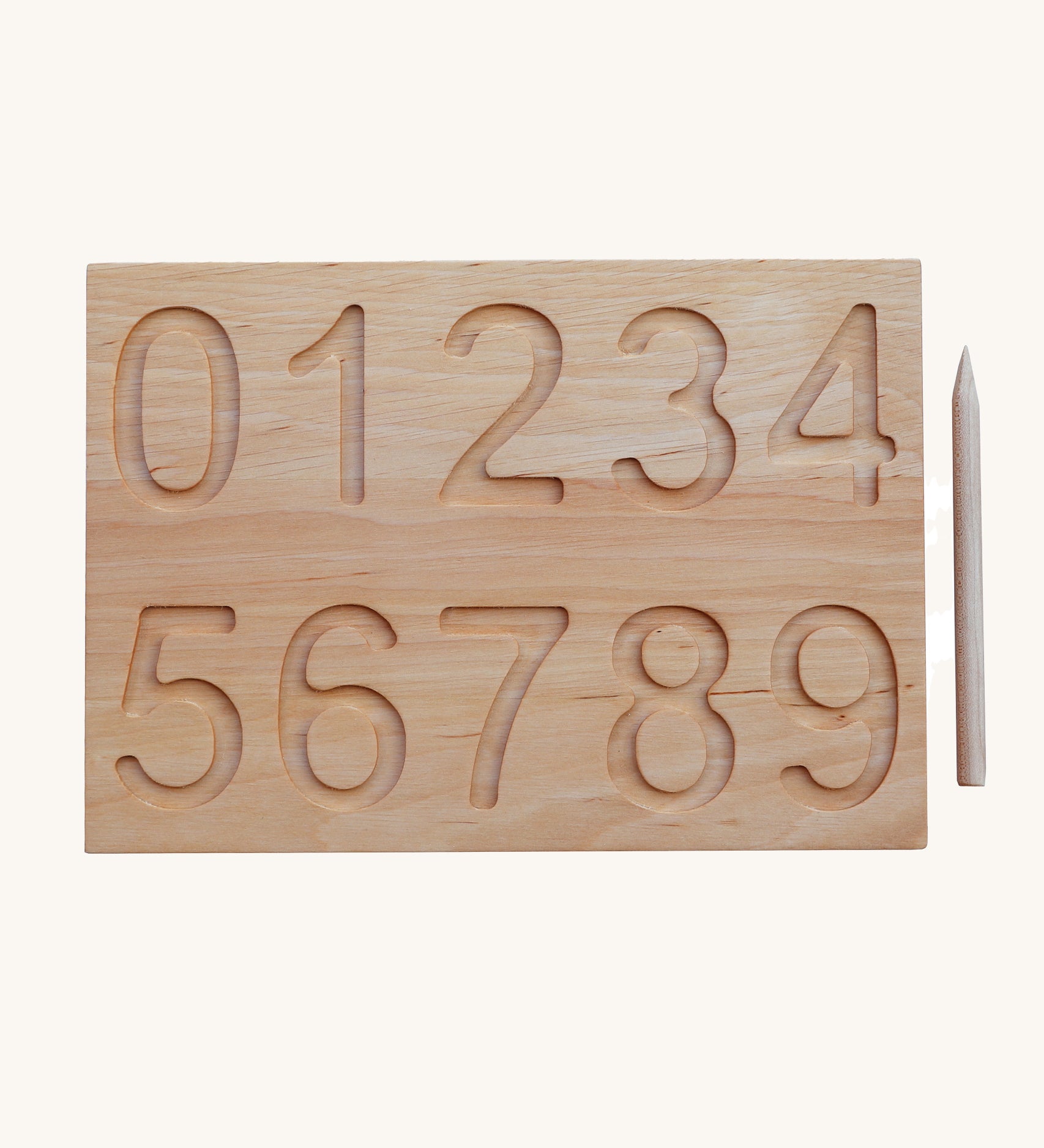 The number side of the Wooden Story Number Tracking Board with the wooden pencil next to it on a plain background. 