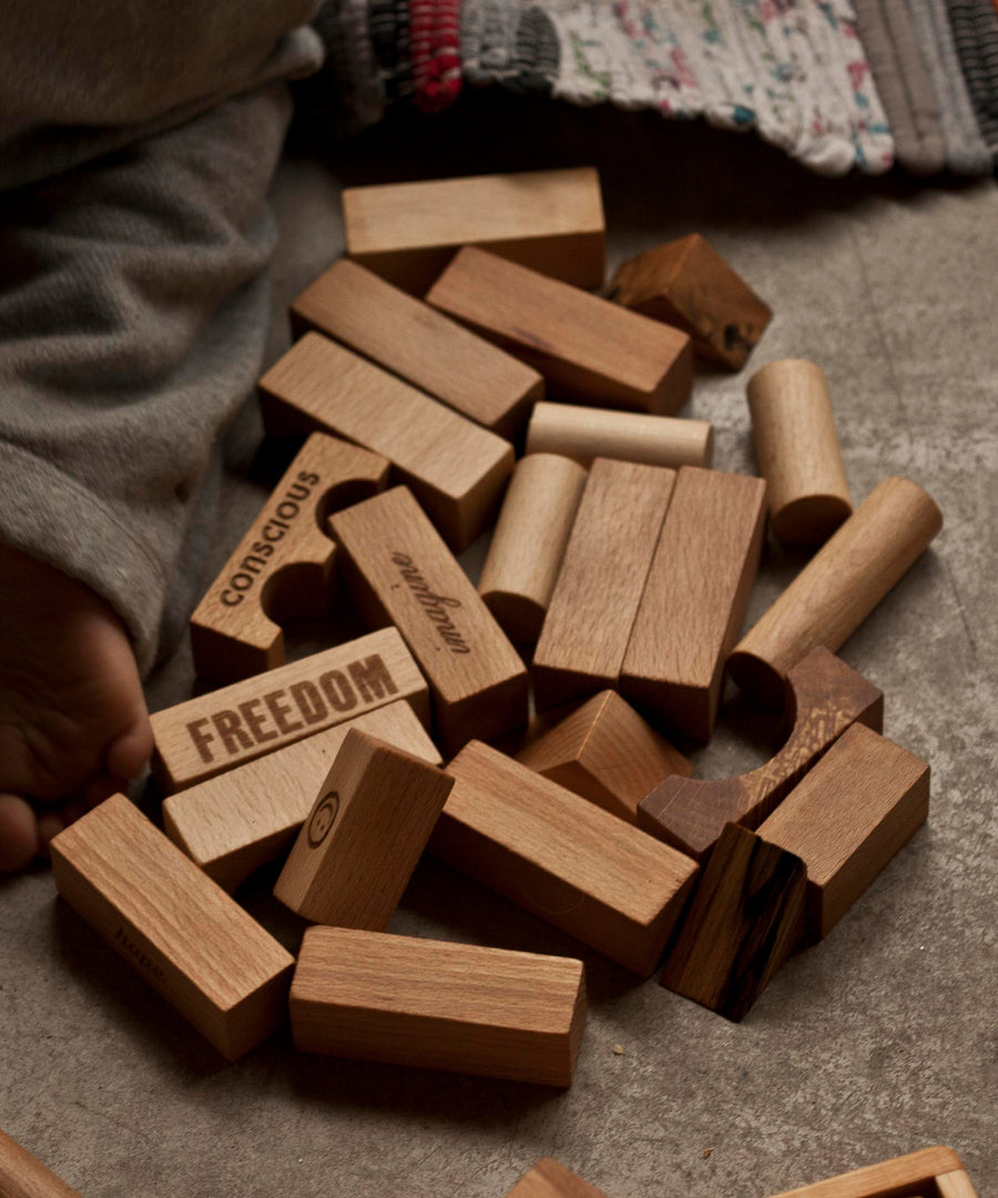 A close up of some Wooden Story natural wooden blocks. 