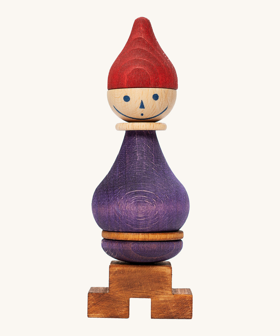 Wooden Story Stacking Toy Stick Figure - No6, a purple stacking wooden figure wearing a red hat. 