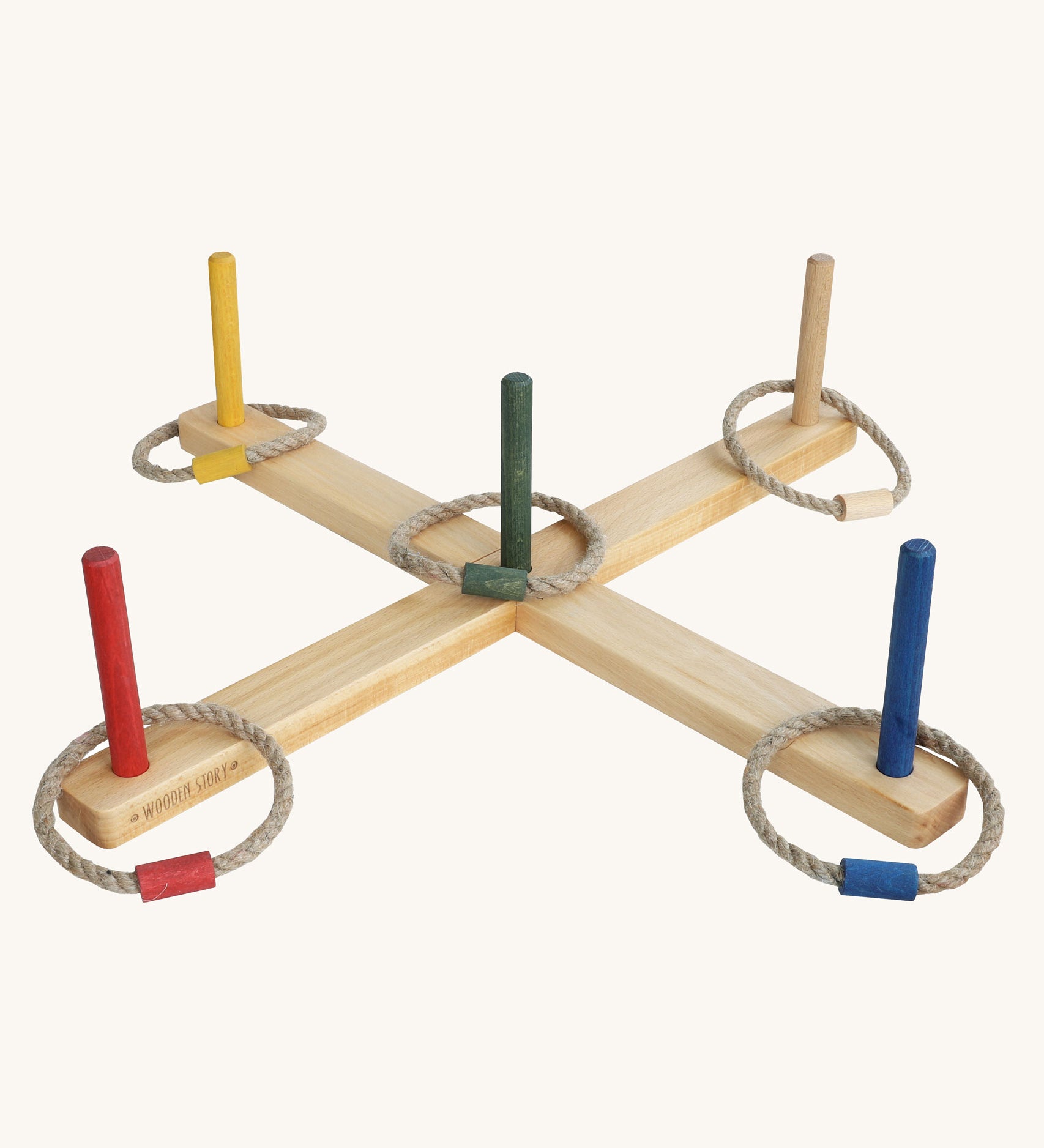 Wooden Story Ring Toss Game with rainbow coloured sticks and rope hoops with co-ordinating coloured connectors. 