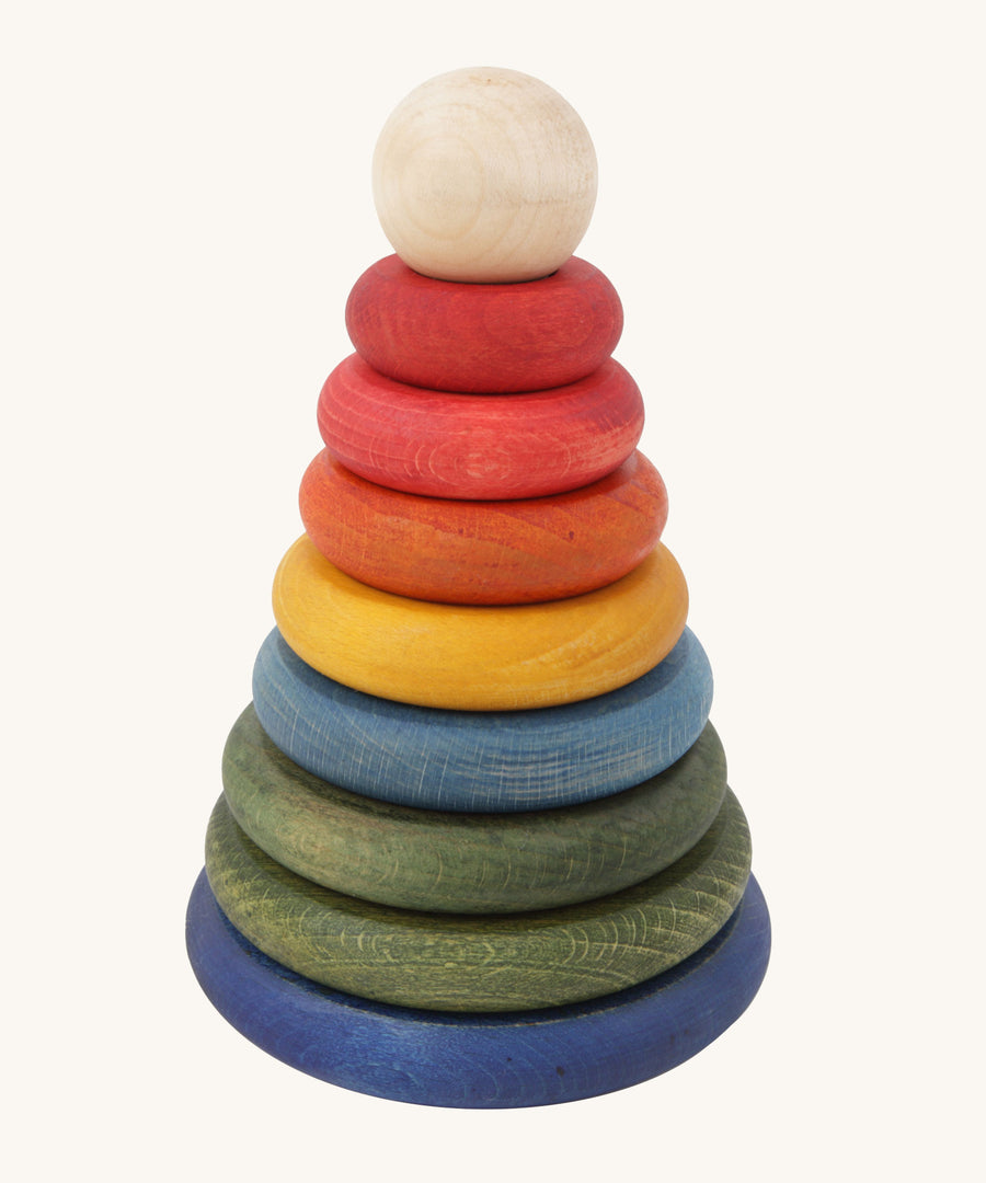 Wooden Story Rainbow Stacker on a plain background. 