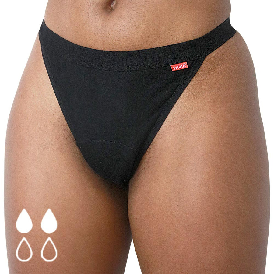 Woman wearing the WUKA eco-friendly basic thong sanitary underwear on a white background