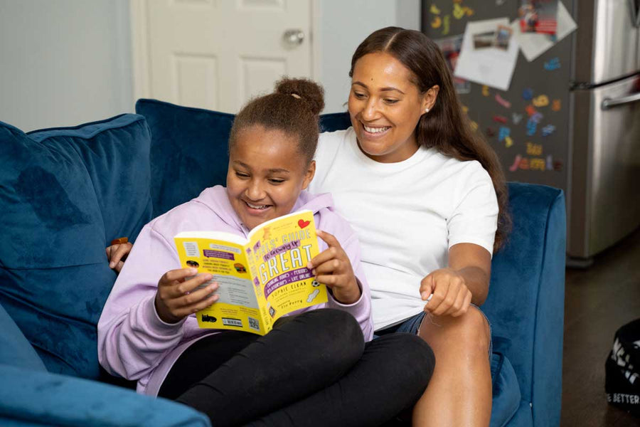 Book from WUKA First Period Pack being read by child