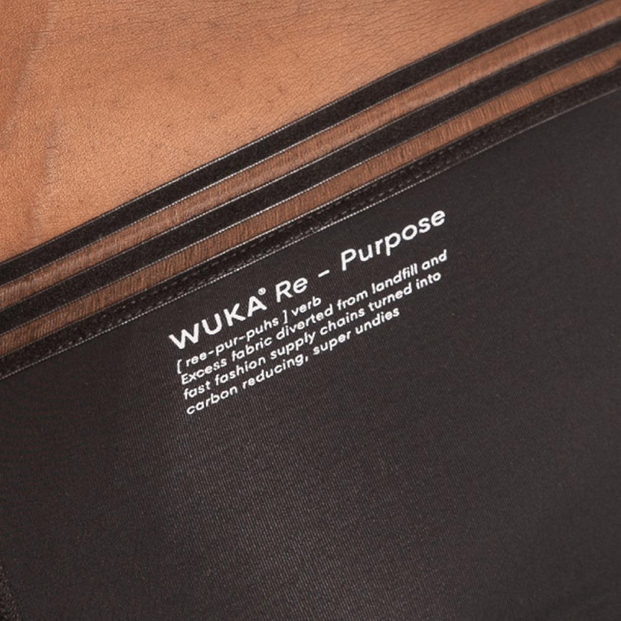 Close up of the WUKA re-purpose logo on the high waisted heavy flow period pants