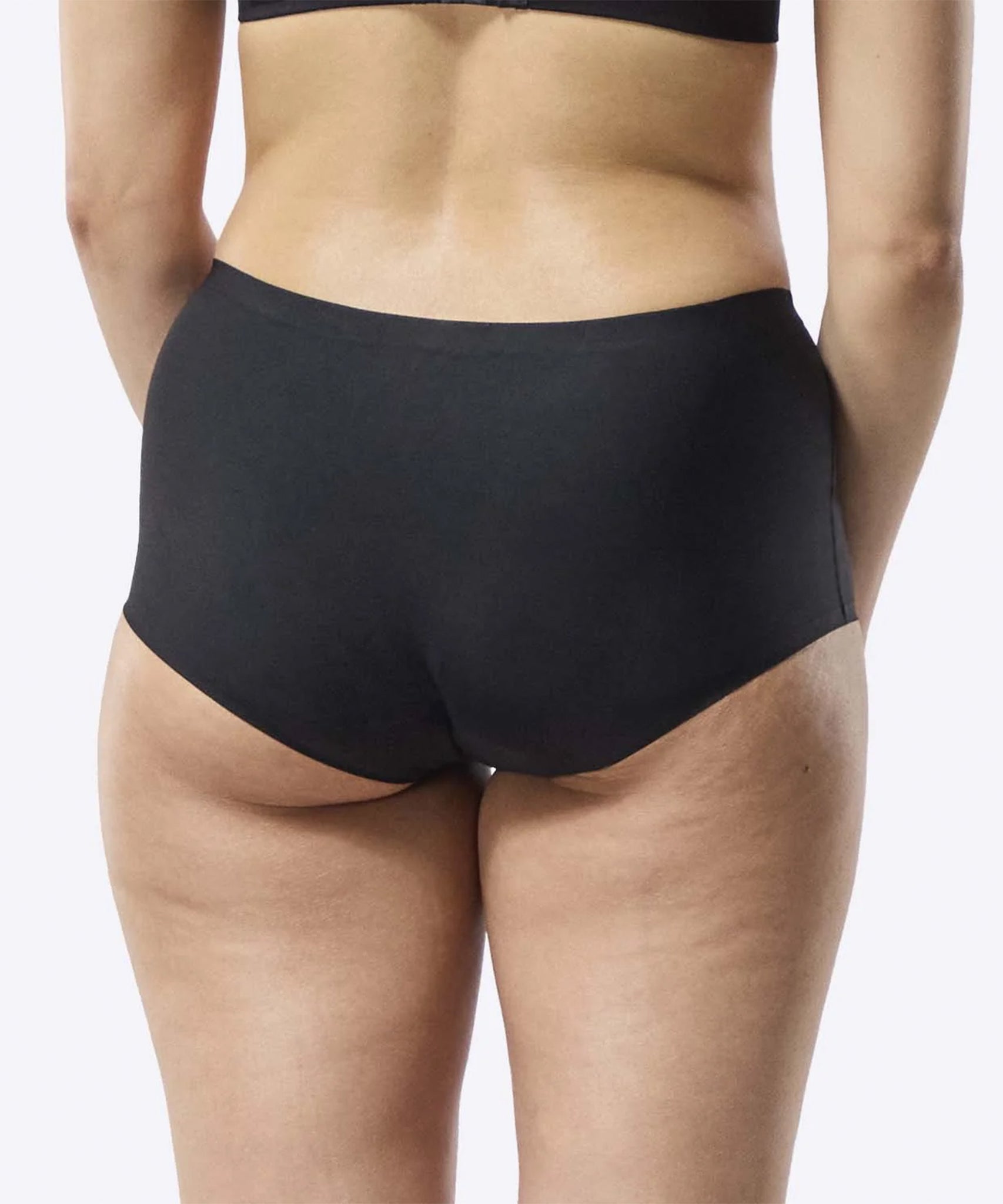 A back view of the WUKA Teen Stretch Boxer Shorts Heavy Flow - Black