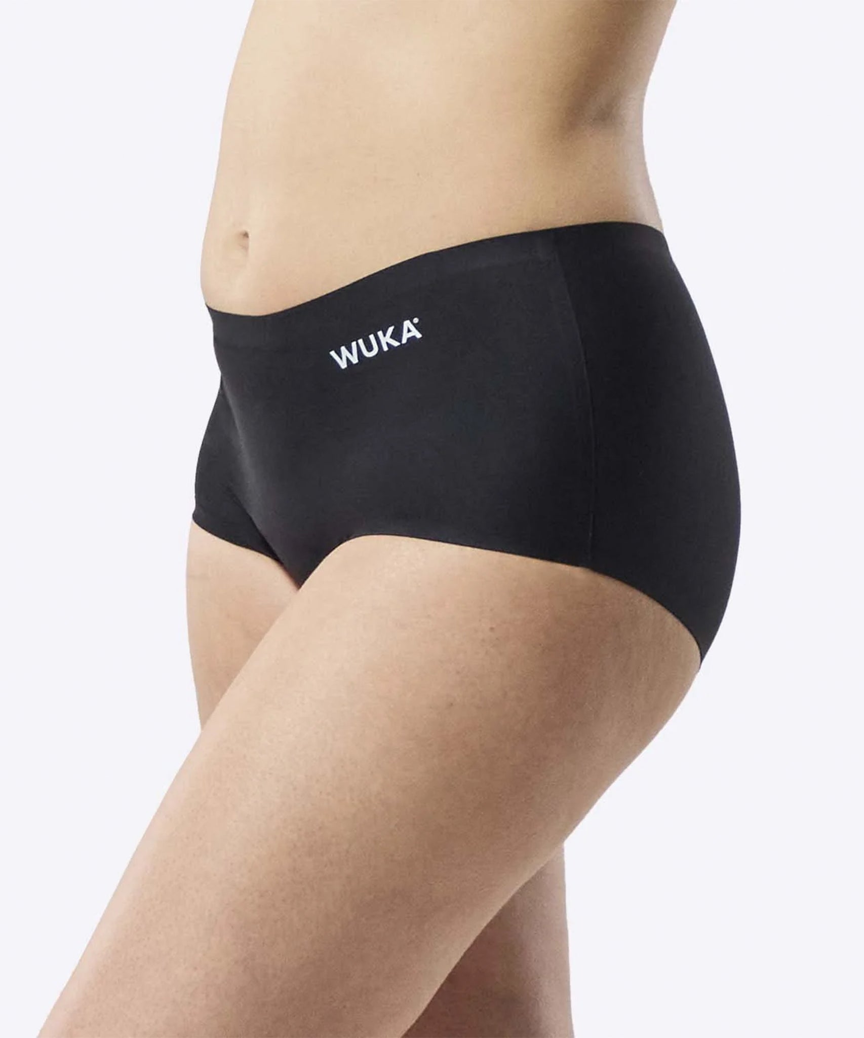 A side view of the WUKA Teen Stretch Boxer Shorts Heavy Flow - Black