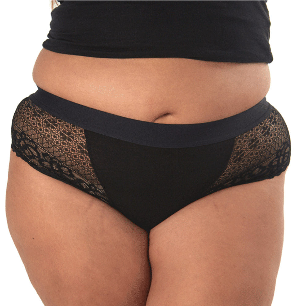 Close up of woman stood on a white background wearing the WUKA medium flow reusable lace hipster brief period pants