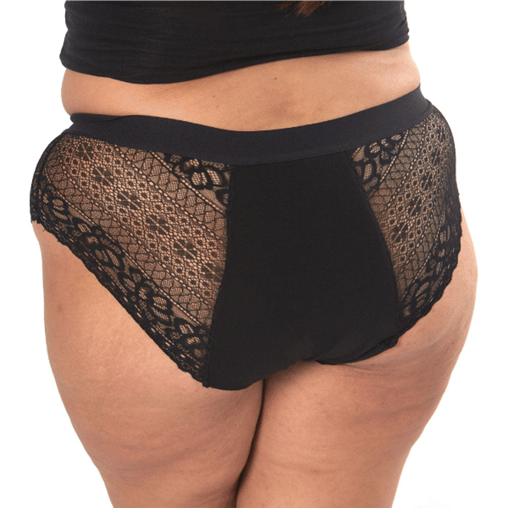 Close up of woman stood on a white background wearing the WUKA medium flow reusable lace hipster brief period pants